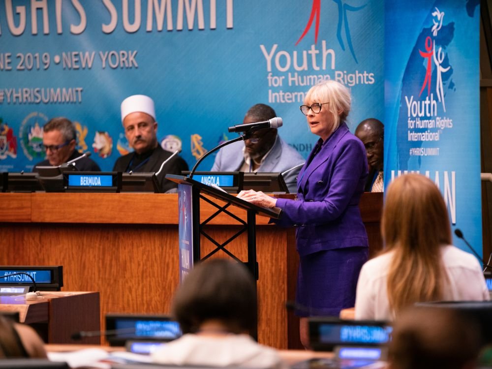 Trish Duggan speaking at a human rights summit